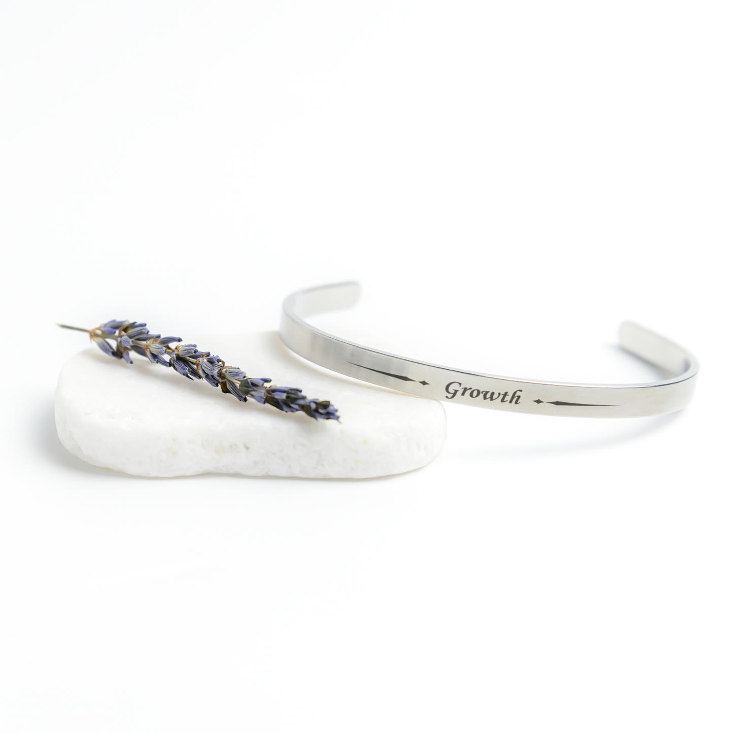 New_Beginnings_2025_-_Growth_Cuff_Bracel_Silver_Lifestyle_03_Mockup.png