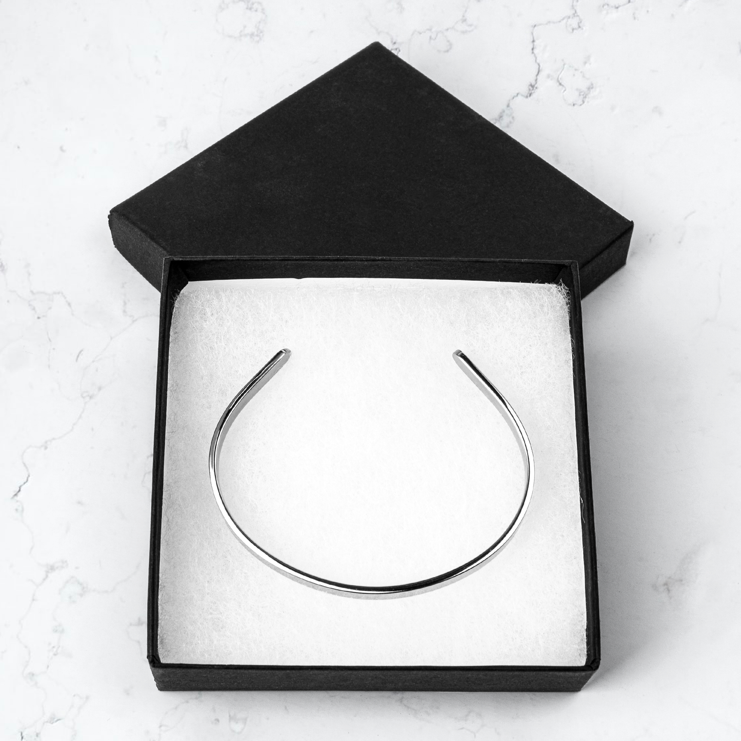 New_Beginnings_2025_-_Joy_Cuff_Bracelet_Bracelet_Packaging_Mockup.png