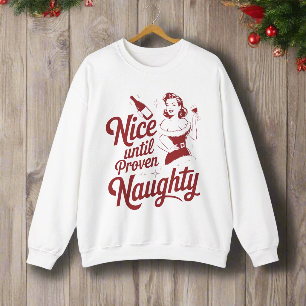 Nice Until Proven Naughty Unisex Heavy Blend™ Crewneck Sweatshirt